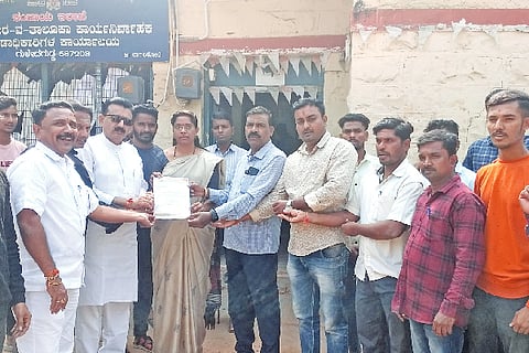 Give land for construction of taluk stadium