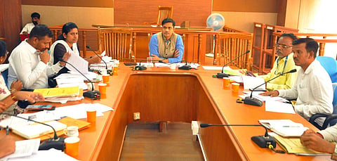 Koppal dc meeting about cmc staff naleen athul
