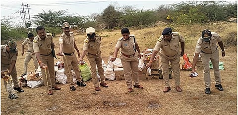 excise department destroy illegal vine bottles