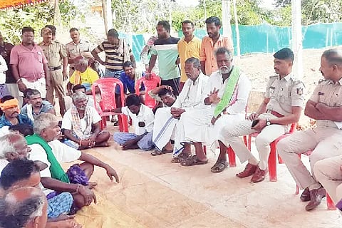 Protest demanding relocation of liquor store