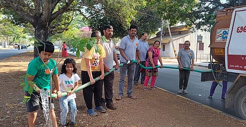 'Team Mysore' watering plants