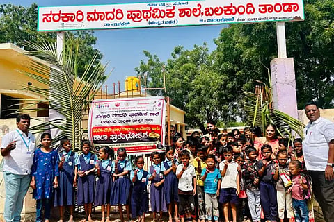 Give rose flower to children and welcome them