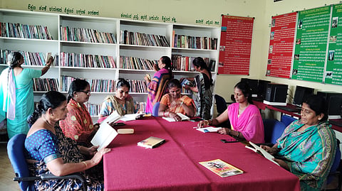 Womens reading in the Ummadahalli Library Mandya