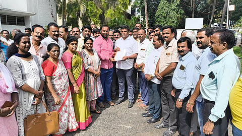 Appeal from District Government Employees Union Mandya