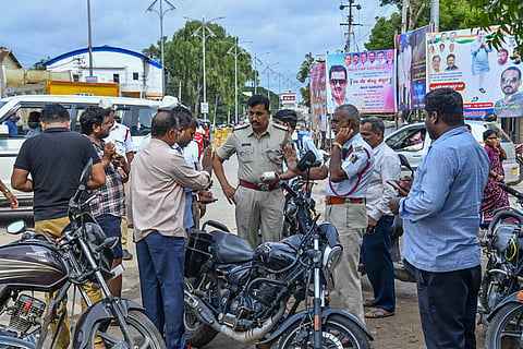 helmet police fine koppal
