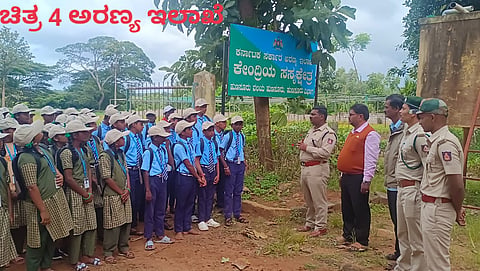 ಹನಗೋಡು ಹೋಬಳಿಯ ನೇರಳಕುಪ್ಪೆ ಸರ್ಕಾರಿ ಪ್ರೌಢಶಾಲೆಯ ಮಕ್ಕಳಿಗೆ ಆಯೋಜಿಸಿದ್ದ ಚಿಣ್ಣರ ವನ ದರ್ಶನದಲ್ಲಿ ಹುಣಸೂರು ಆರ್‌ಎಫ್‌ಒ ಸುಬ್ರಮಣ್ಯ ಪರಿಸರ ಪಾಠ ಮಾಡಿದರು. ಕುಮಾರಸ್ವಾಮಿ, ಪ್ರಮೋದ್ ಇತರರು ಇದ್ದಾರೆ.