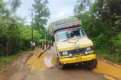 ROAD DAMMAGED