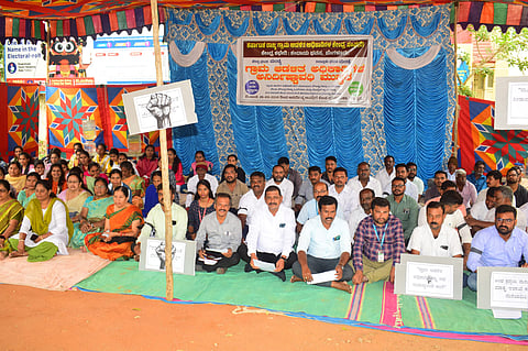 Village administration officials protest Mandya