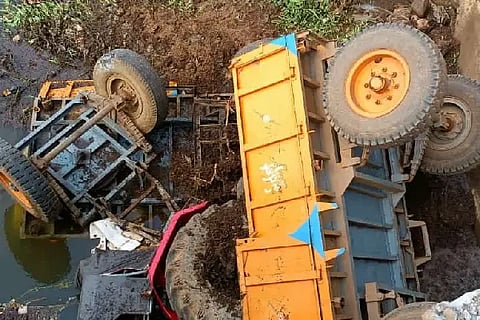The tractor fell into the river