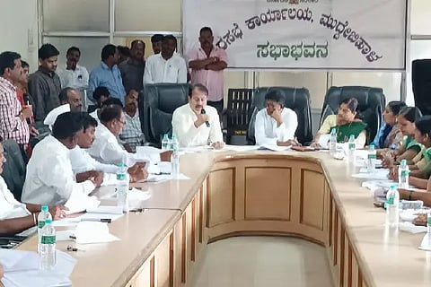 malfeasance, MLA, slum, title deed, sewage board, investigation, encroachment,