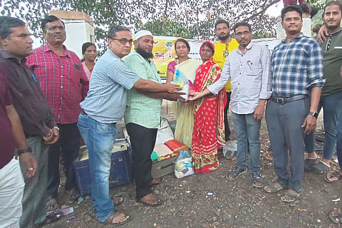 Distribution of food, clothes to poor residents