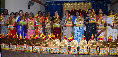 Memorial gift distribution program Mandya