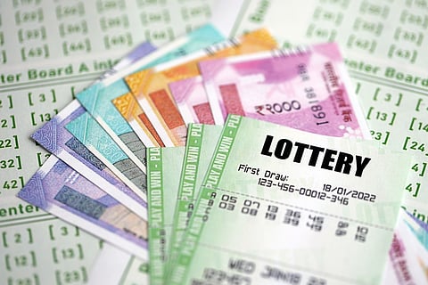 Green,Lottery,Tickets,And,Indian,Rupees,Money,Bills,On,Blank
