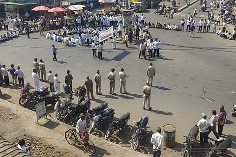 Protest by blocking the road