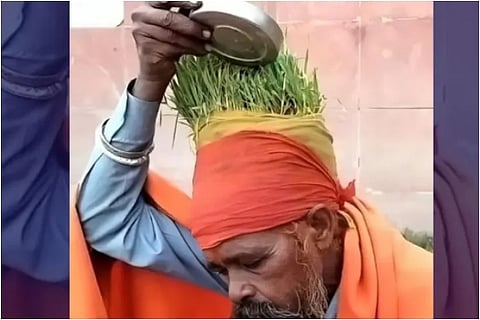 Sadhu Cultivating Wheat On  His Head