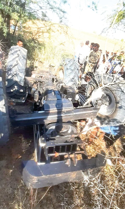 tractor overturns