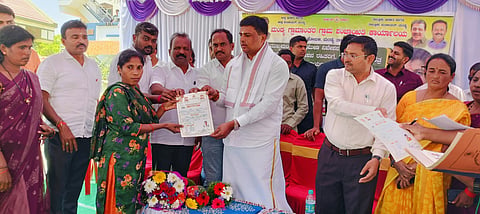 MLA distributes title deeds for the site Mandya