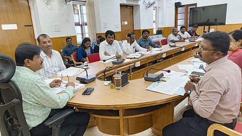 Progress review meeting Mandya