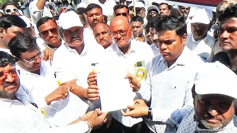 Protest demanding payment of outstanding amount