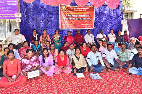 Village administration officials protest Mandya