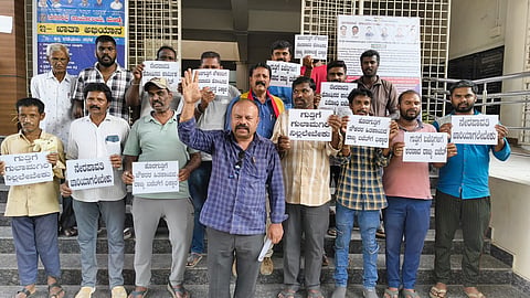 Outsourced employees protest Mandya