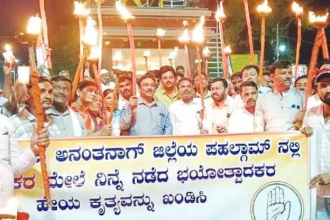 Torch procession by Congress workers