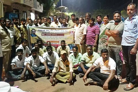 Torch procession by civic workers in Badami
