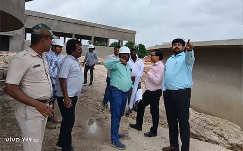 Officer inspecting JJM work