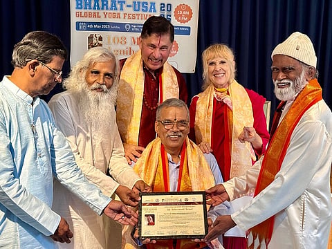 Yoga guru Dr. Raghavendra Pai was presented with an award