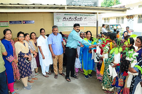Cloth hand bags and plant distribution Mandya