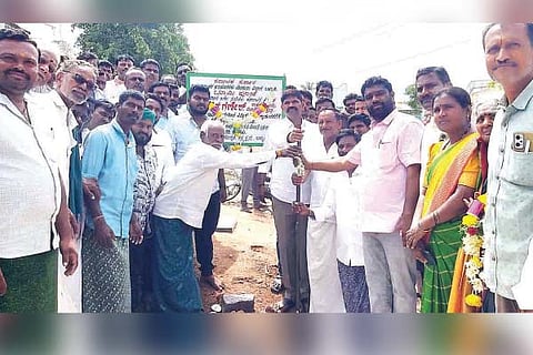 Kampli road development work launched