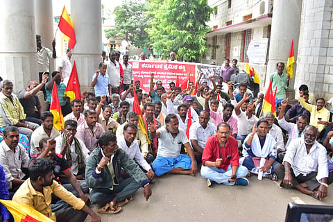Loading and unloading workers protest Mandya