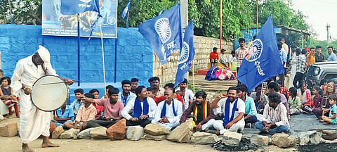 Mud falls on Ambedkar's portrait in Honnalli