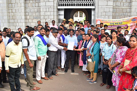 Residential school employees protest Mandya