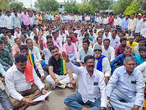 district koppal labour construction protest kit