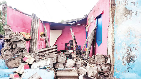 child dies after house wall collapses