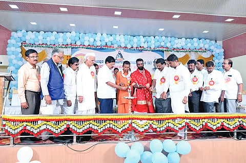 Establish a development corporation for the Tri-faith community