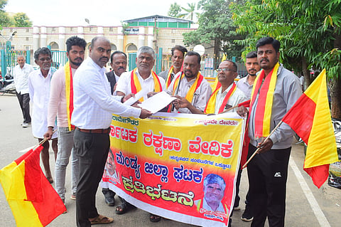 Protest demanding the implementation of the bilingual education policy Mandya