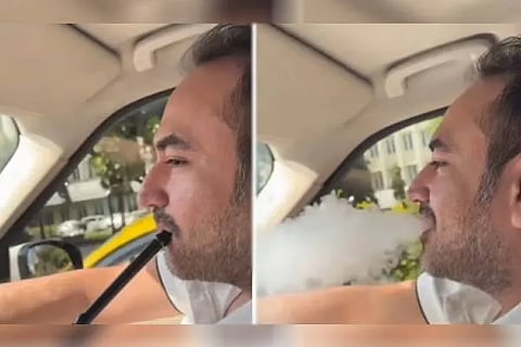 smoking hukha in a car