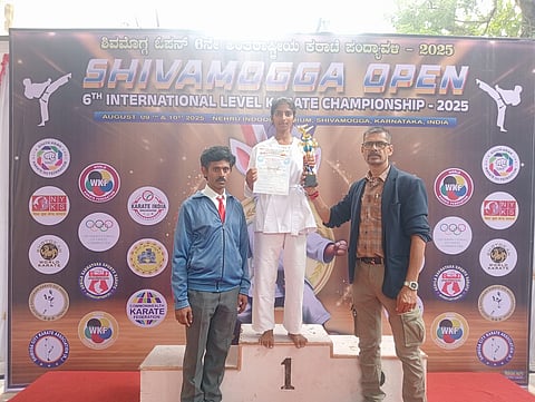 Varuna is the champion in karate competition Mandya