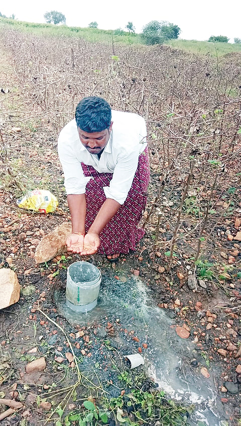 water bubbling in a dried-up borewell