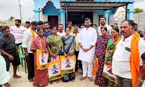 Distribution of clothes to working class construction workers Mandya