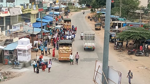 Commuters struggle due to the lack of a bus stop at Dibburahalli Circle.