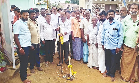 MLA K.M. Uday performed the groundbreaking ceremony for a drainage development project in the Scheduled Caste colony of Karkahalli village. A.S. Rajiv, Harish Babu, and others were present.