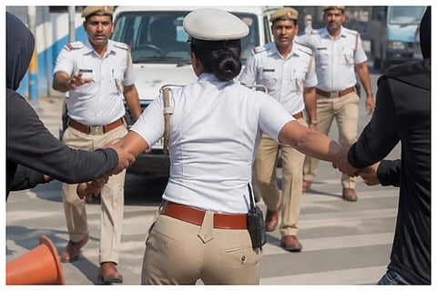Four booked for assaulting Bengaluru woman PSI
