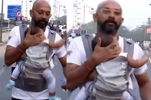 ಮಗುವನ್ನು ಎದೆಗೆ ಕಟ್ಕೊಂಡು ತಂದೆಯಿಂದ ಮ್ಯಾರಥಾನ್​ ಓಟ