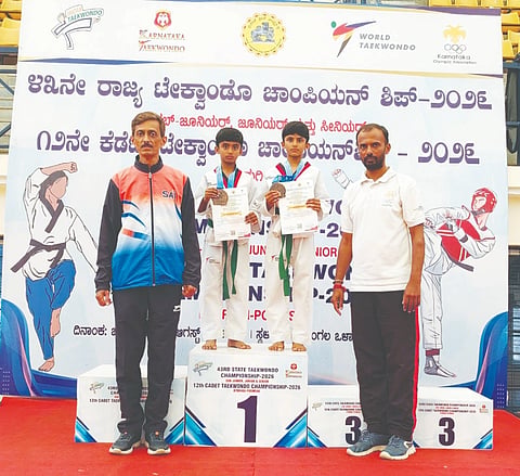 ಕರ್ನಾಟಕ ಟೆಕ್ವಾಂಡೋ ಸಬ್ ಜೂನಿಯರ್ ಚಾಂಪಿಯನ್‌ಶಿಪ್ 43ನೇ ಕರಾಟೆ ಸ್ಪರ್ಧೆಯಲ್ಲಿ ಕಂಚಿನ ಪದಕ ಪಡೆದ ಮಲ್ಲೇಶ್ ಹಾಗೂ ಮಾದೇಶರ್ ಜತೆ ಕರಾಟೆ ಮಾಸ್ಟರ್ ಗೋವಿಂದು ಇದ್ದಾರೆ.