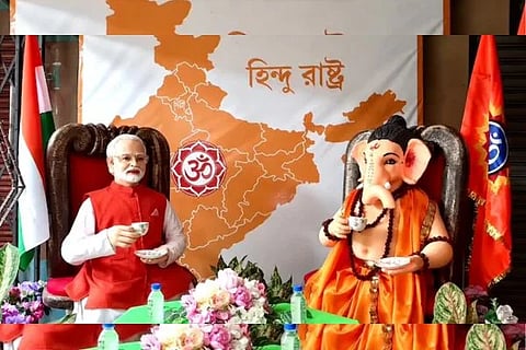 PM Modis Statue With Ganesh