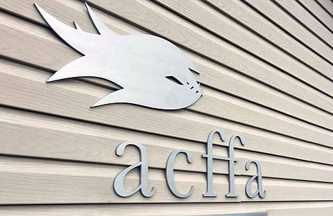 Atlantic Canada Fish Farmers Association logo on a wall. 