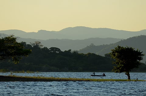 A fishing boat on Lake Kariba, the world's largest artificial lake, which lies on the border between Zambia and Zimbabwe.